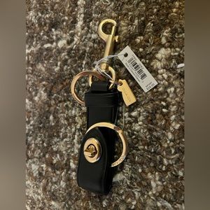 NWT Black Leather and Rose Gold Coach Keychain